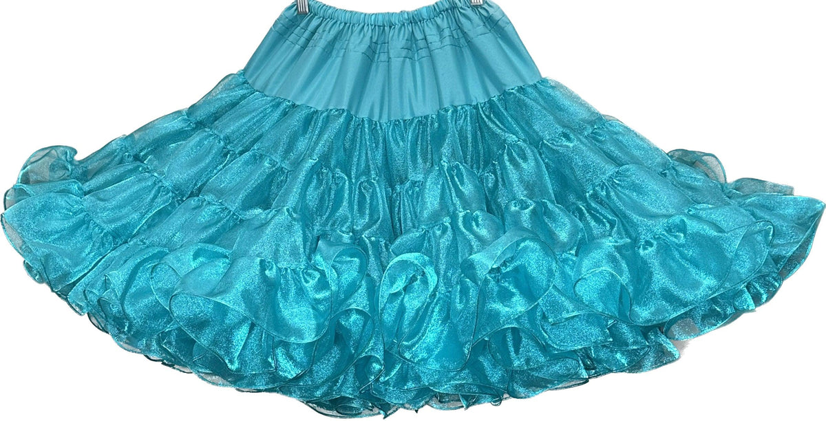A Crystal Petticoat skirt from Square Up Fashions hanging on a hanger.