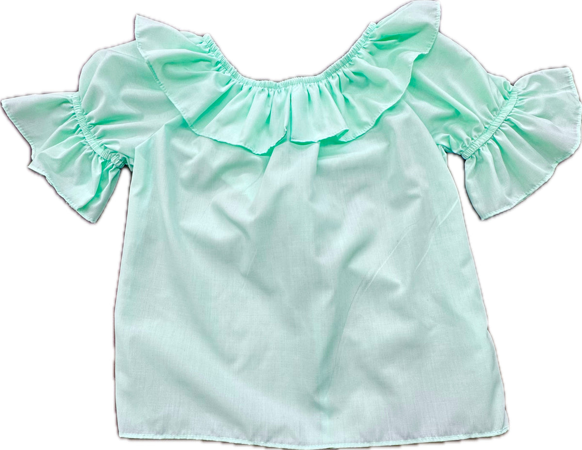 The Square Up Fashions Scoop Neck Blouse features a light green color, wide ruffled neckline, split ruffle collar, and short ruffled sleeves, shown laid flat on a white background.