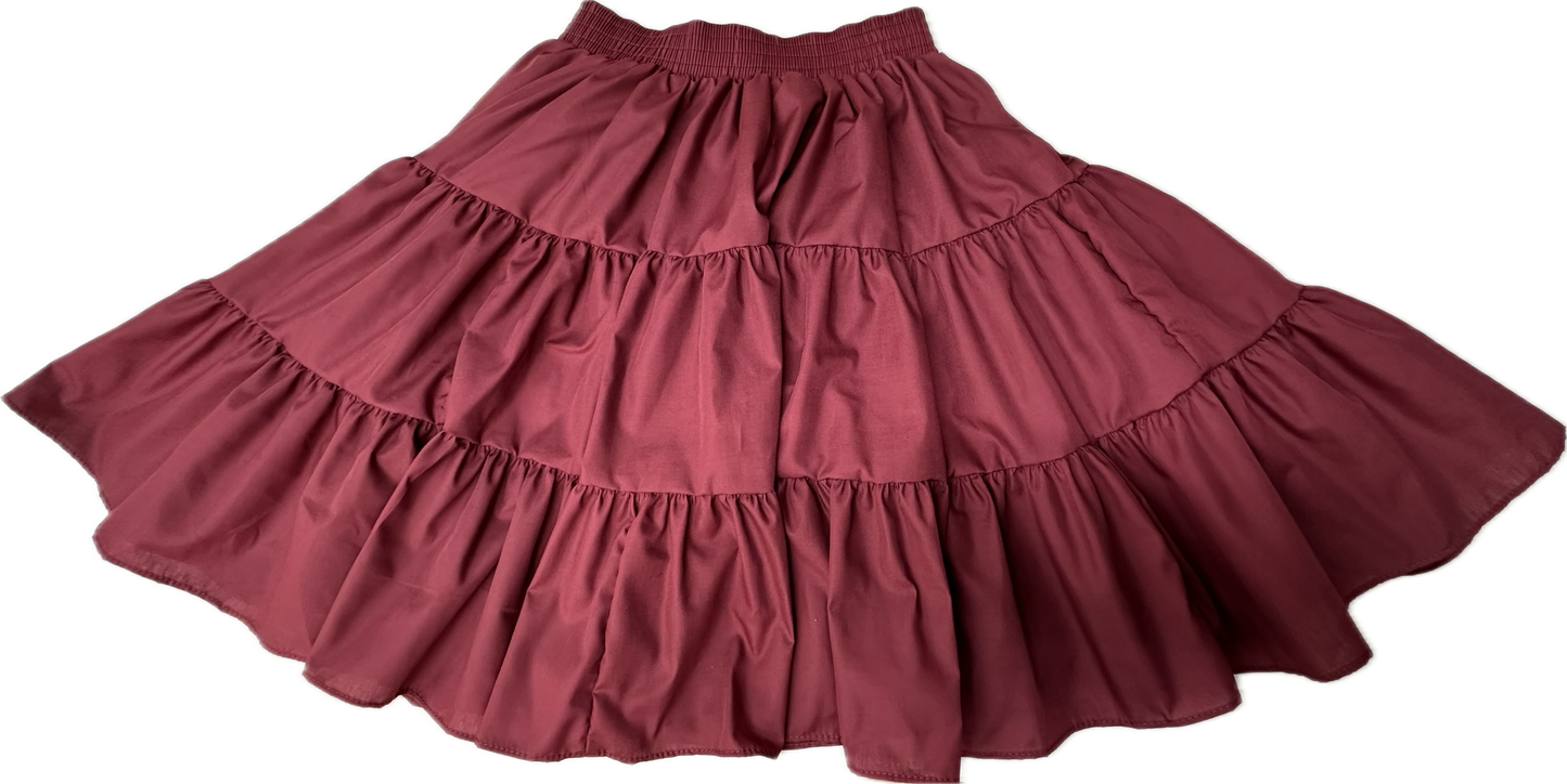 The Square Up Fashions Basic 3 Tier Square Dance Skirt features maroon ruffled layers, an elastic waistband, and a knee-length design—perfect for elevating your wardrobe, shown on a white background.
