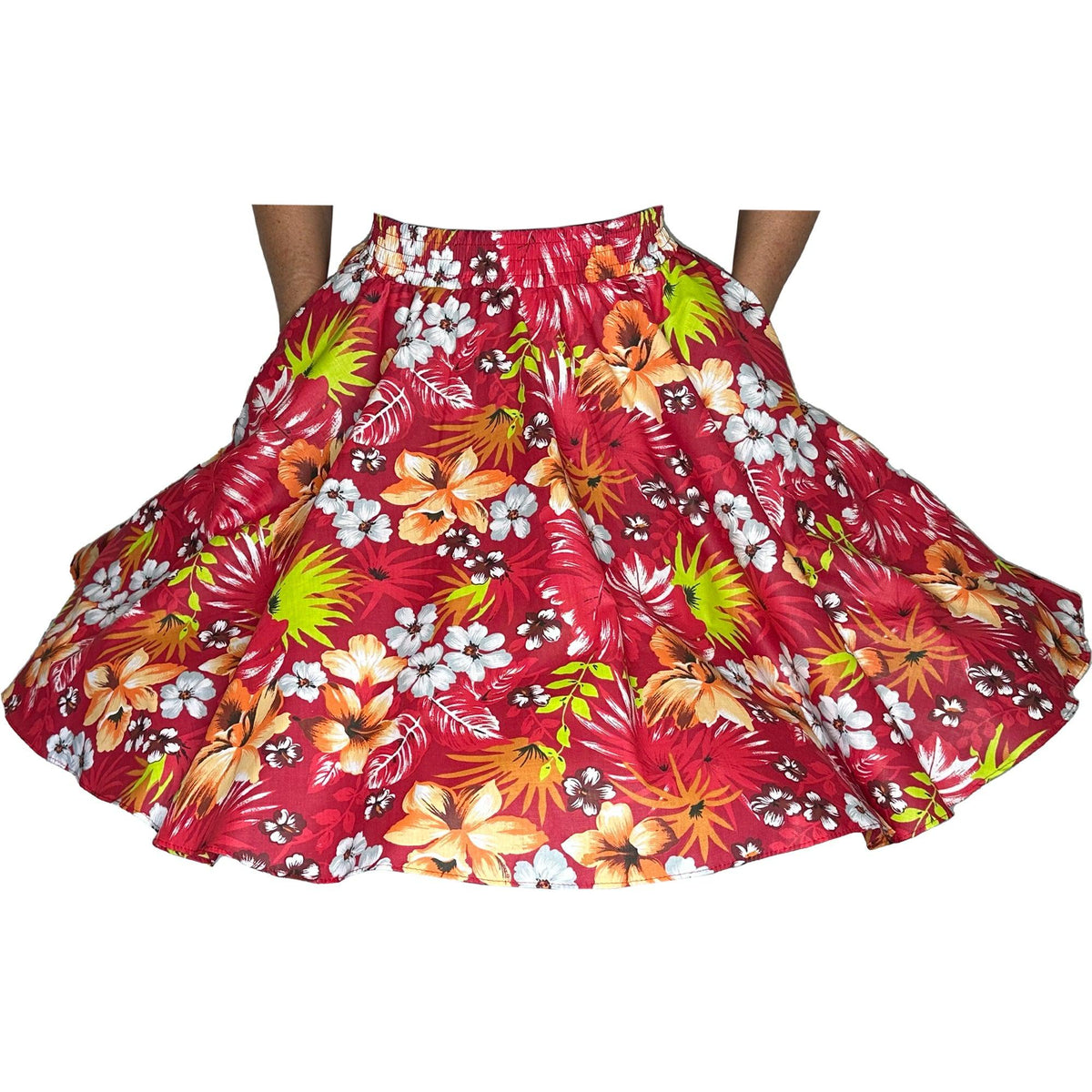 A woman wearing a red Tropical Hawaiian Square Dance Skirt with palm leaves and Hibiscus flowers from Square Up Fashions.