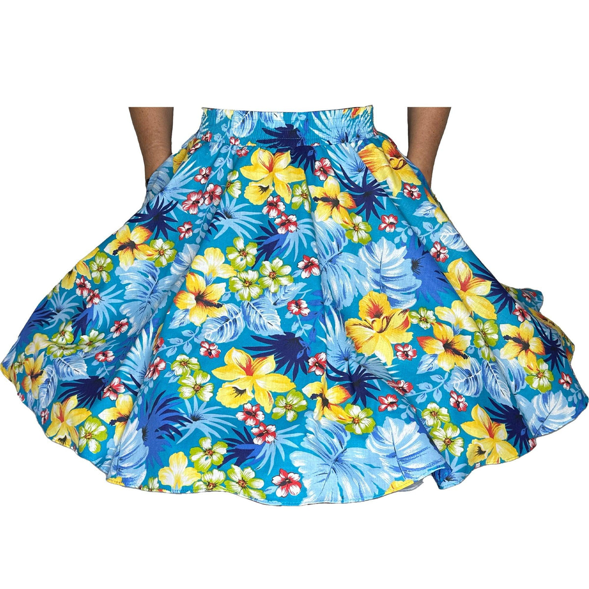A person wearing a Tropical Hawaiian Square Dance Skirt adorned with hibiscus flowers from Square Up Fashions.