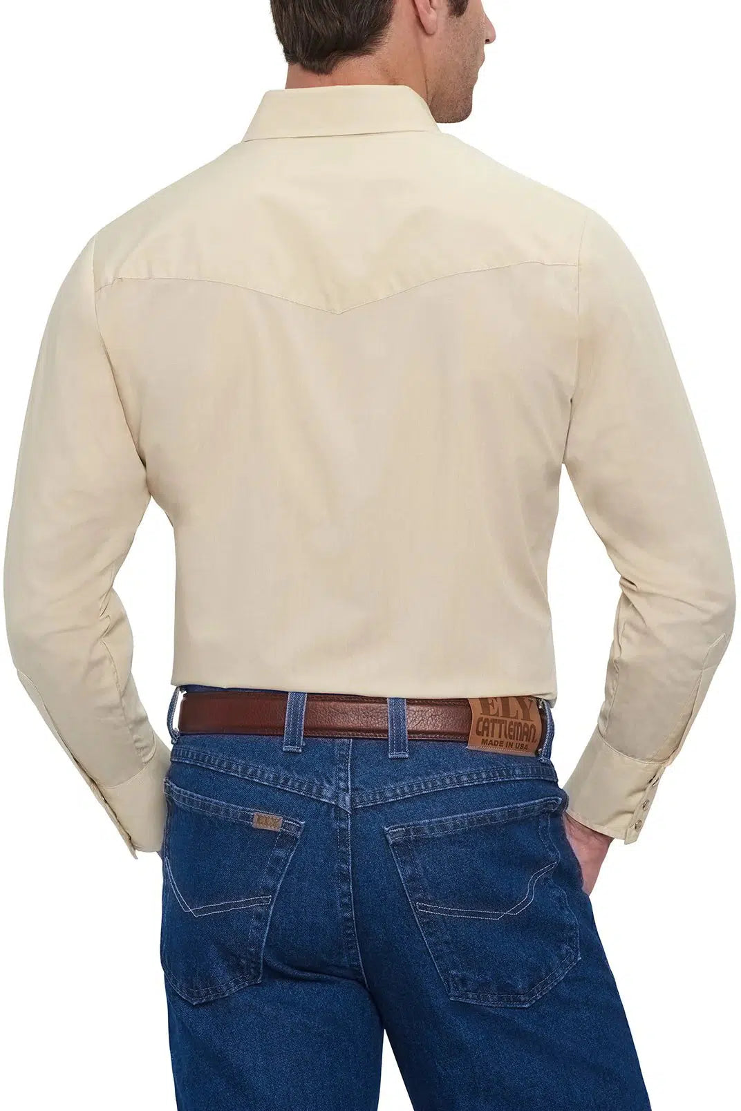 The back of a man wearing jeans and a tan shirt with ELY Mens Long Sleeve Solid Western Snap Solid Shirt.