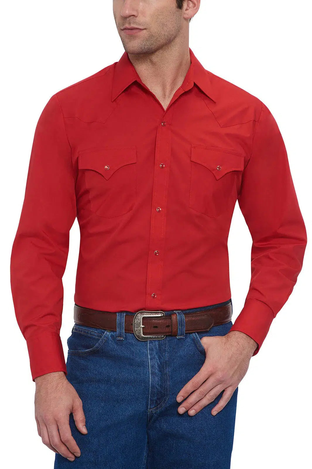 A man wearing a red ELY long sleeve western shirt and jeans.