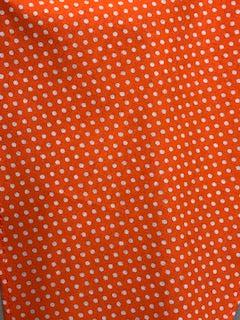 Description: A CLEARANCE Polka Dot Scarf Tie in orange, made of 100% cotton, hanging on a hanger from Square Up Fashions.