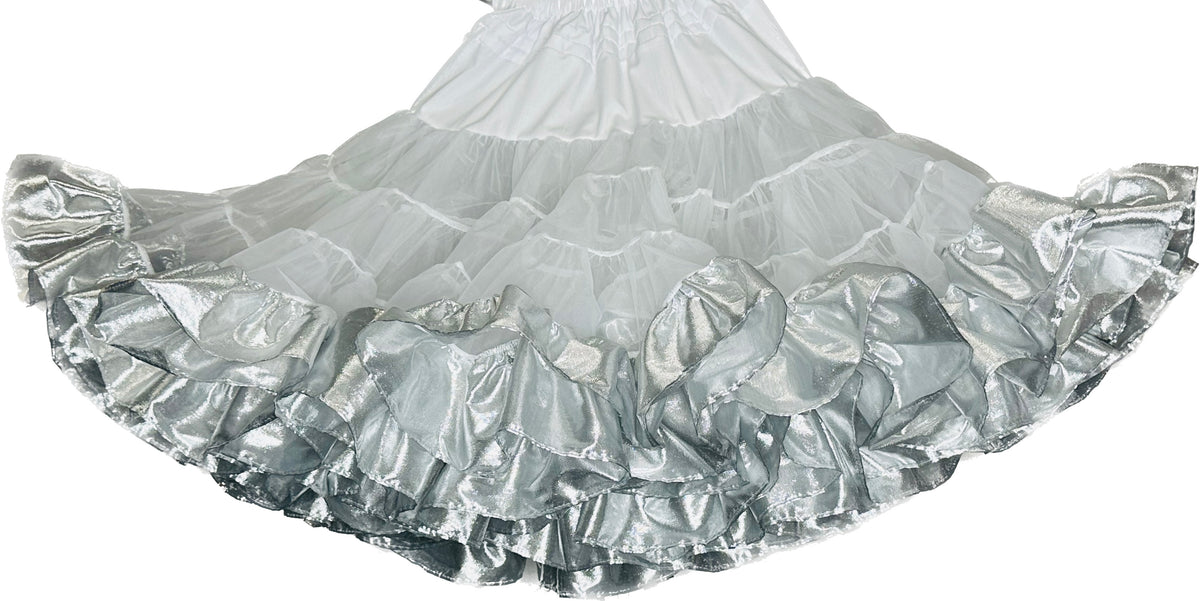 A white and silver Square Up Fashions Combo Metallic Petticoat skirt, made of fabric, on a white background.