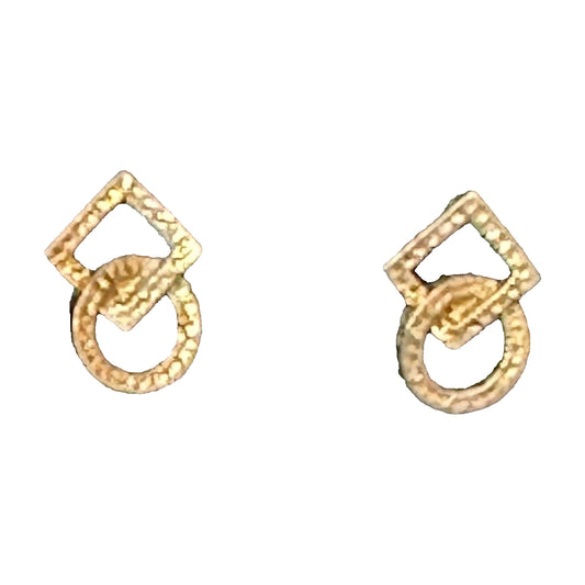 Square Up Fashions' Post Square and Round Dance Earrings feature a geometric design with a diamond-shaped top and textured circular bottom. Displayed on a black card, they're perfect as unique dance jewelry for any occasion.