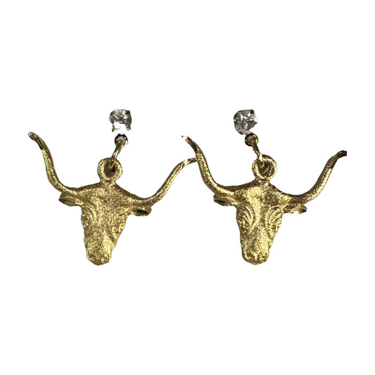 Description: A pair of Golden Steer earrings from Square Up Fashions, featuring diamond-looking studded gold bull heads.