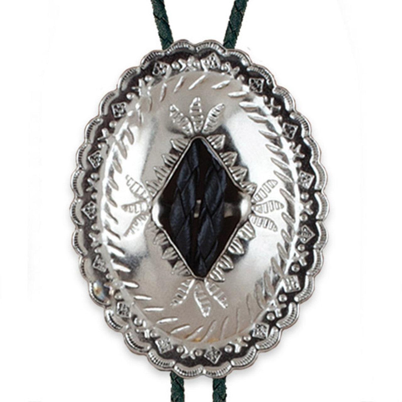 A showy Western Express silver concho bolo tie with a black stone, measures 2 inches wide, and is secured by a green cord.