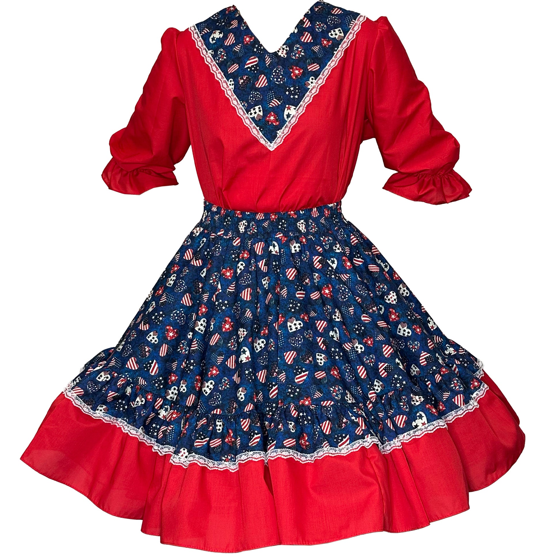 The Americana Square Dance Outfit by Square Up Fashions has a red bodice, puffed sleeves, and a full blue-patterned skirt with white lace trim and American flag motifs—perfect for vintage-inspired style.