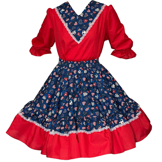 The Americana Square Dance Outfit by Square Up Fashions has a red bodice, puffed sleeves, and a full blue-patterned skirt with white lace trim and American flag motifs—perfect for vintage-inspired style.