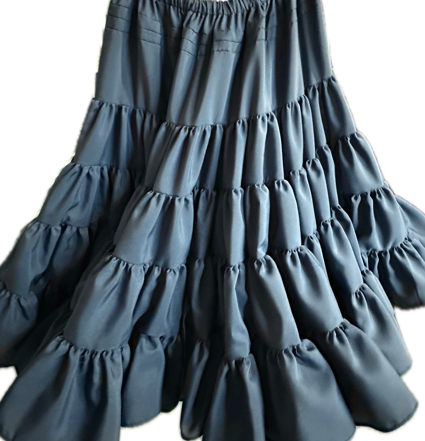 The DISCOUNTED Softer Poly-Liner Petticoat by Square Up Fashions, available in 4 colors, is perfect as a square dance petticoat. Shown here in dark gray polyester with long tiered ruffles against a white background.