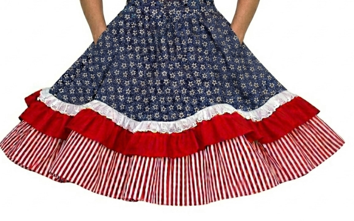 Celebrate U.S. independence in the Square Up Fashions Patriotic Spirit 250th Anniversary Skirt, featuring blue stars, white trim, a red ruffle, and red-and-white stripes—perfect for festive occasions!.
