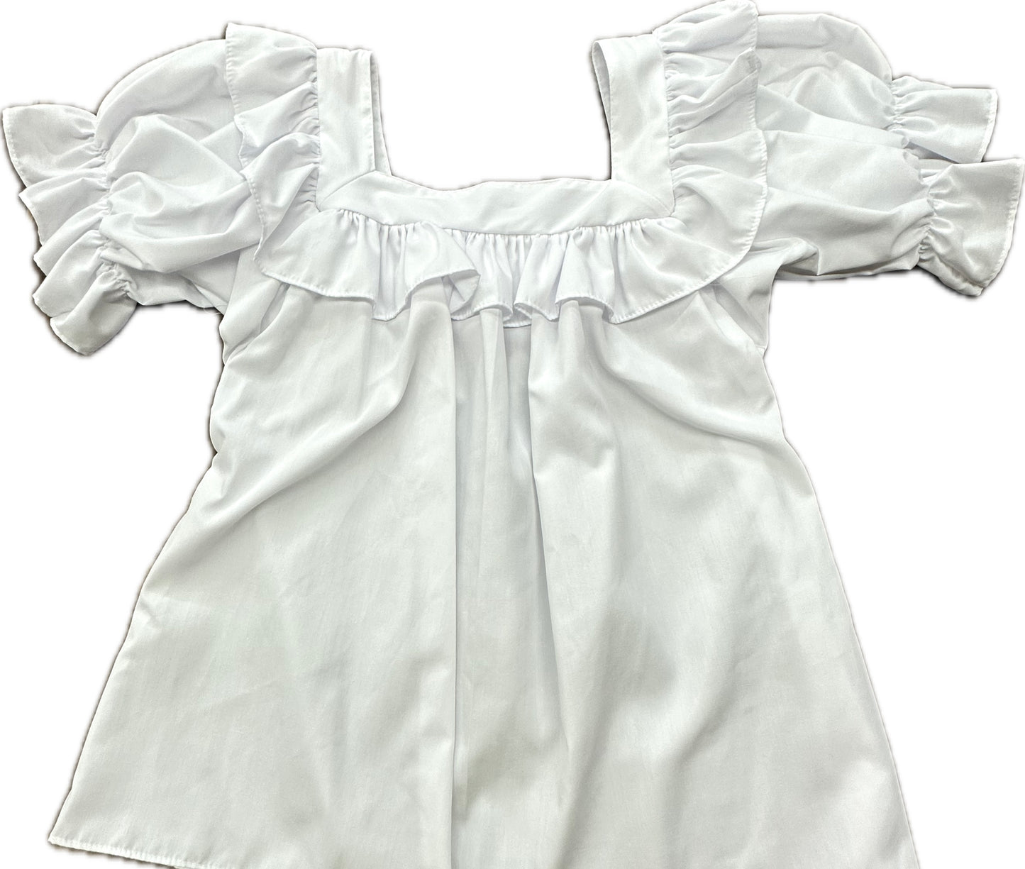 The Square Neck Blouse by Square Up Fashions features ruffled puff sleeves, a flattering fit, and is designed to stay tucked. Displayed laid flat on a white background.