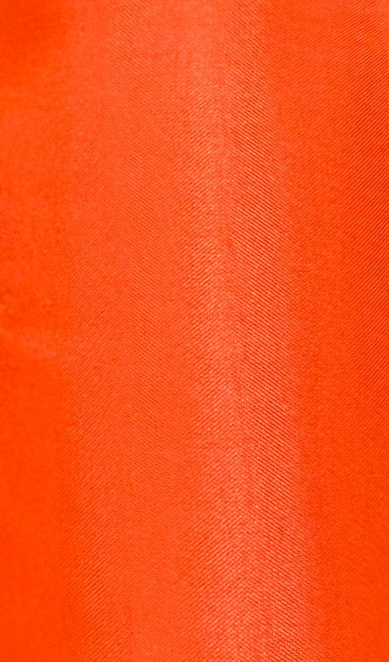 Close-up of bright orange Softer Poly-Liner Petticoat fabric by Square Up Fashions, featuring a shiny, textured finish with a subtle diagonal weave—perfect for vibrant square dance slips. Now discounted and available in 5 colors!.