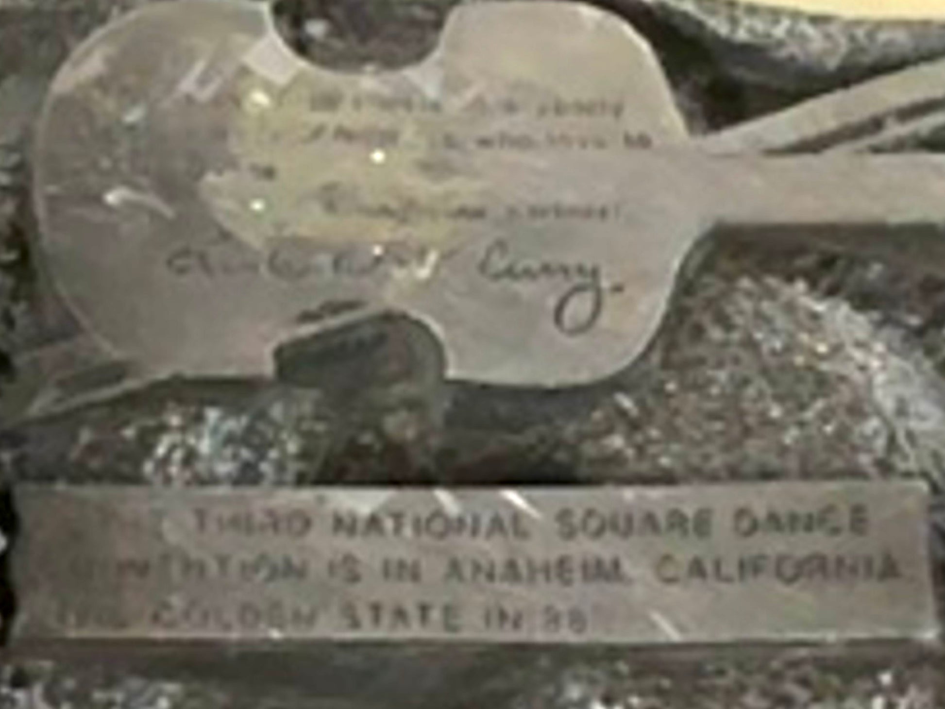 Square Up Fashions' Square Dance Buckle w/ instruments features a guitar-shaped design and engraved text commemorating the 1954 Third National Square Dance Convention in Anaheim, California—the "Golden State.