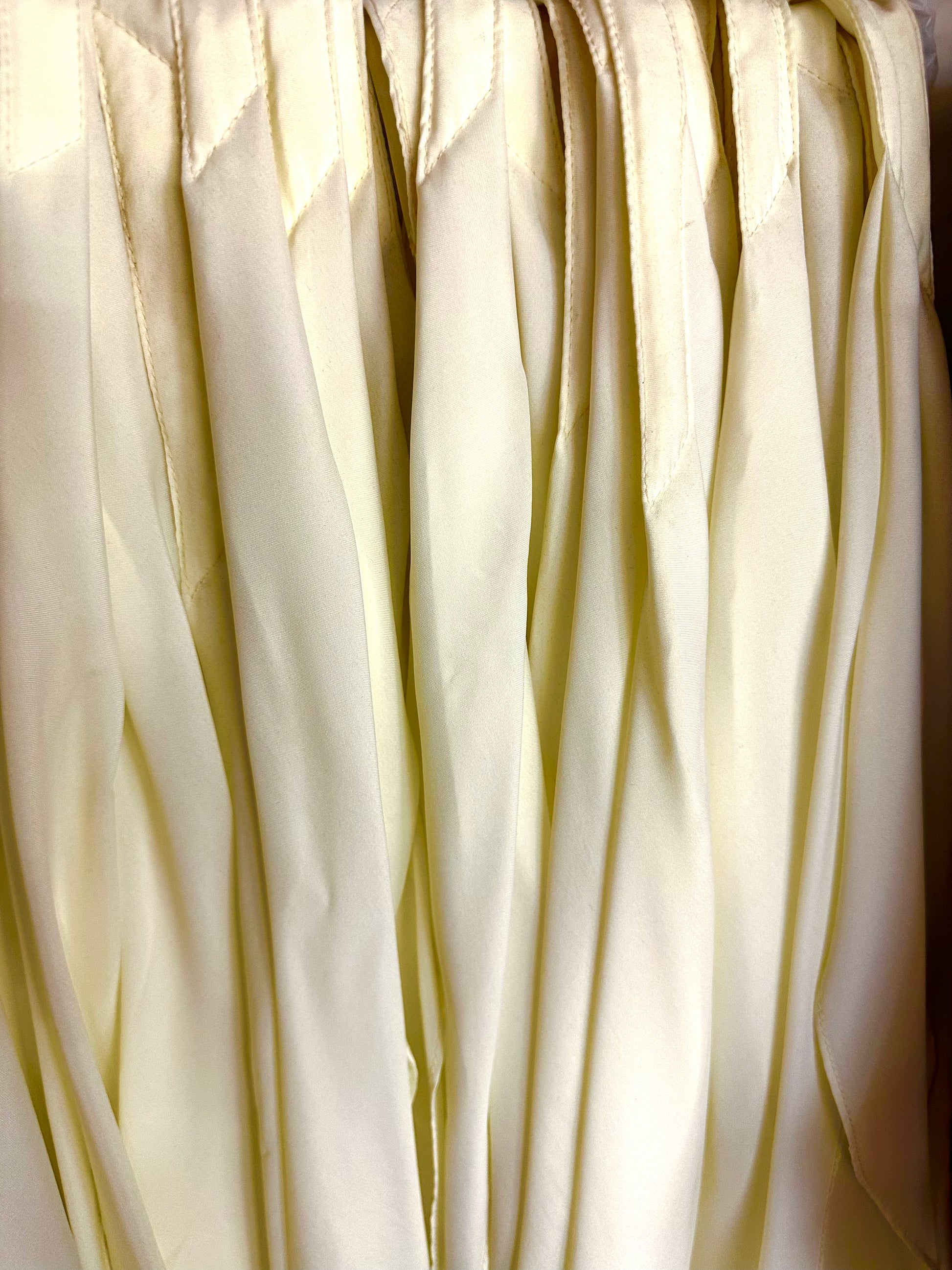 Several white collared shirts hang closely on a rack, each styled with Square Up Fashions’ CLEARANCE Light Weight Thin Polyester Scarf Ties for a classic, polished look.
