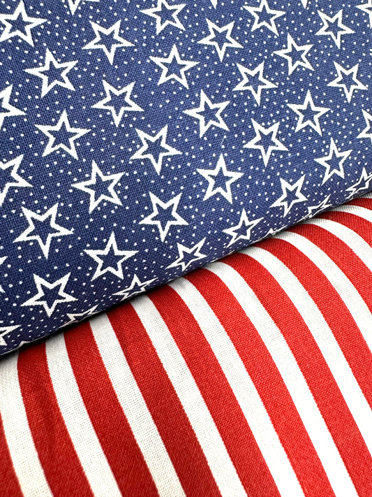 Close-up of two fabrics from the Patriotic Spirit 250th Anniversary Skirt by Square Up Fashions: blue with white stars and red-and-white vertical stripes—perfect for celebrating the Declaration of Independence.