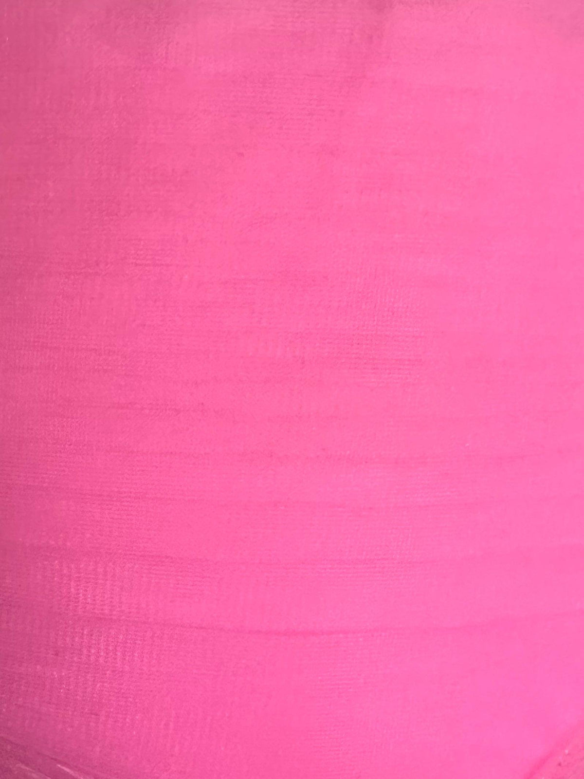 Close-up of a textured pink nylon &quot;Square Up Fashions&quot; Organdy Stiff Petticoat with visible horizontal weave patterns.