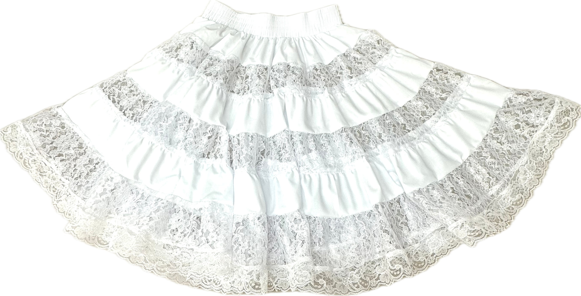 The Square Up Fashions Overall Lace Square Dance Skirt is a white, six-tiered skirt with see-through lace, layered ruffles, and a wide elastic waistband, displayed flat on a white background.