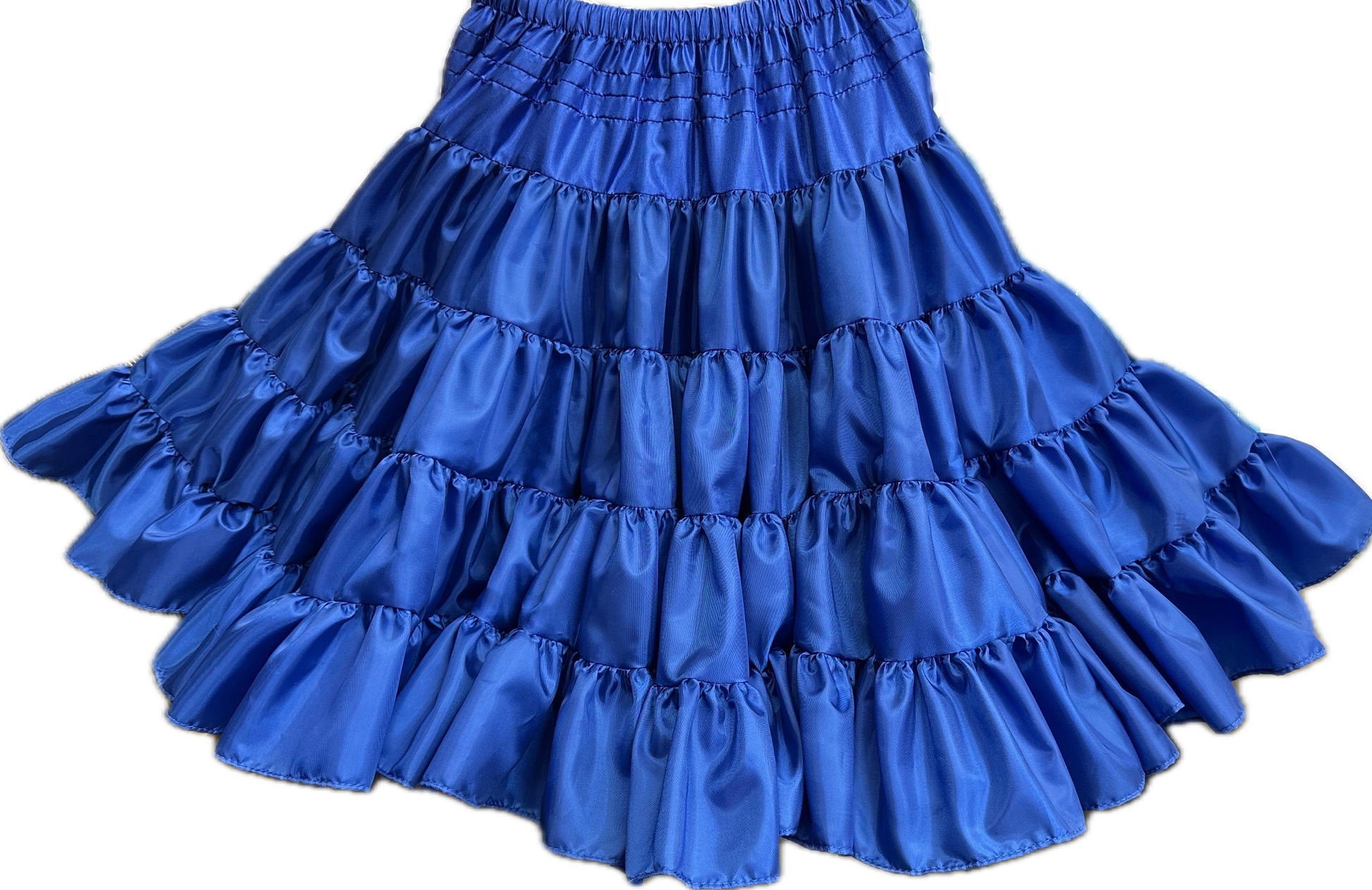 The Square Up Fashions Soft Poly-Liner Petticoat is a bright blue, multi-layered ruffled skirt with an elastic waistband and polyester petticoat, ideal for square dancing and shown against a white background.
