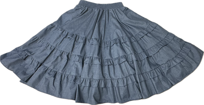The Double Ruffle Square Dance Skirt by Square Up Fashions is a long blue skirt with an elastic waistband and layered double ruffles, shown in custom sizes laid flat.