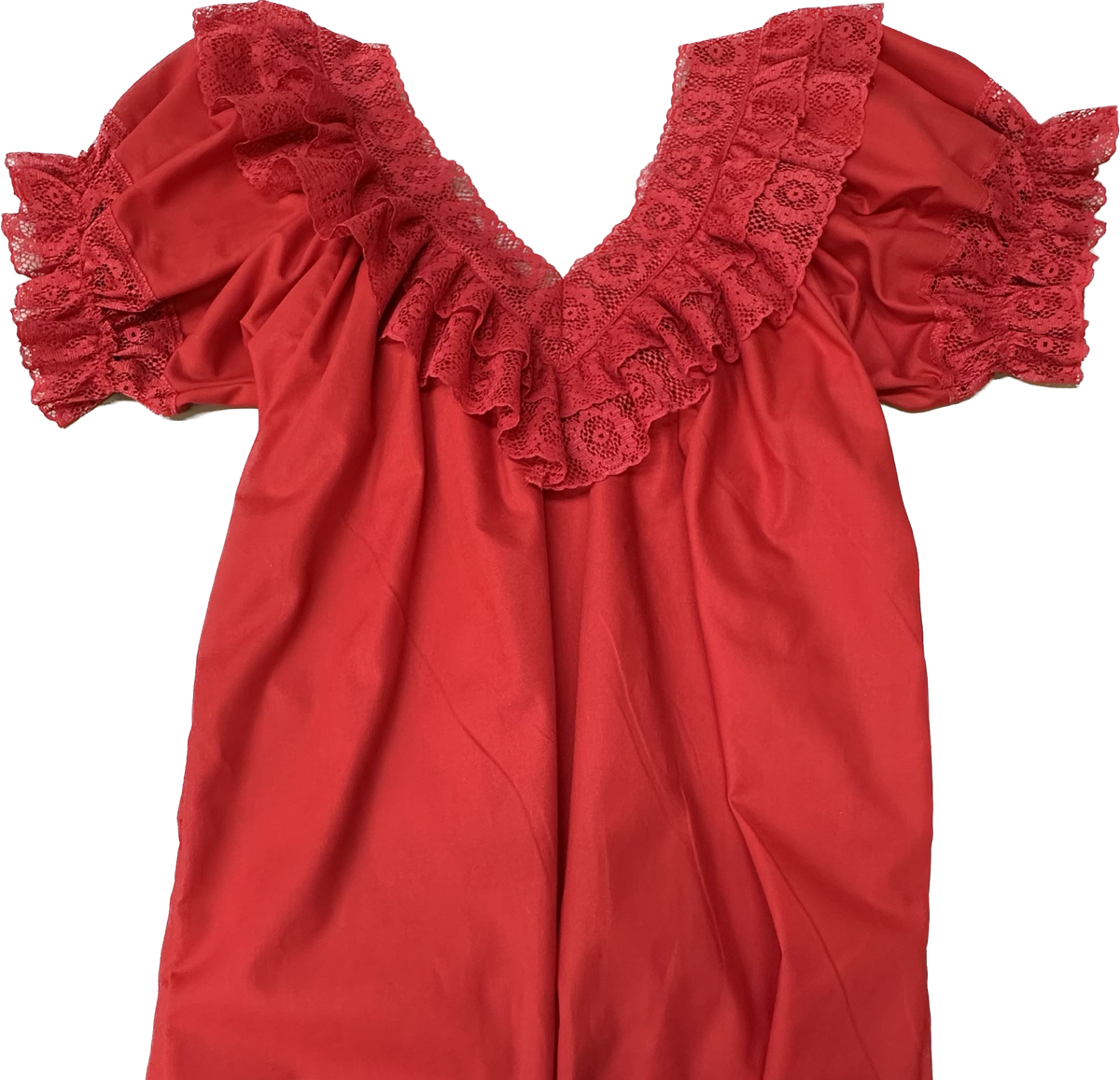An Fiesta V-Neck Blouse from Square Up Fashions with ruffles on it.