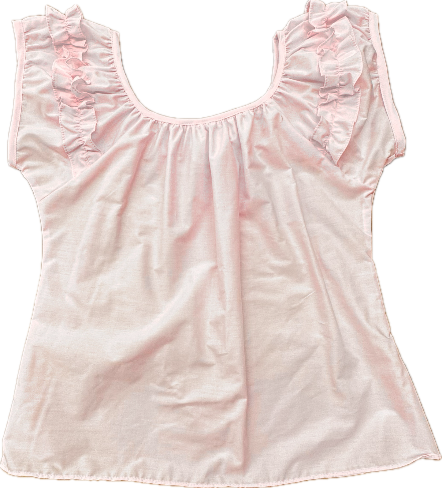 The Basic Ruffle Blouse by Square Up Fashions features light pink fabric, shoulder ruffles, a scoop neck, and cap sleeves. Shown laid flat on a white background, this vintage-inspired blouse offers a loose fit and is available in custom sizes.