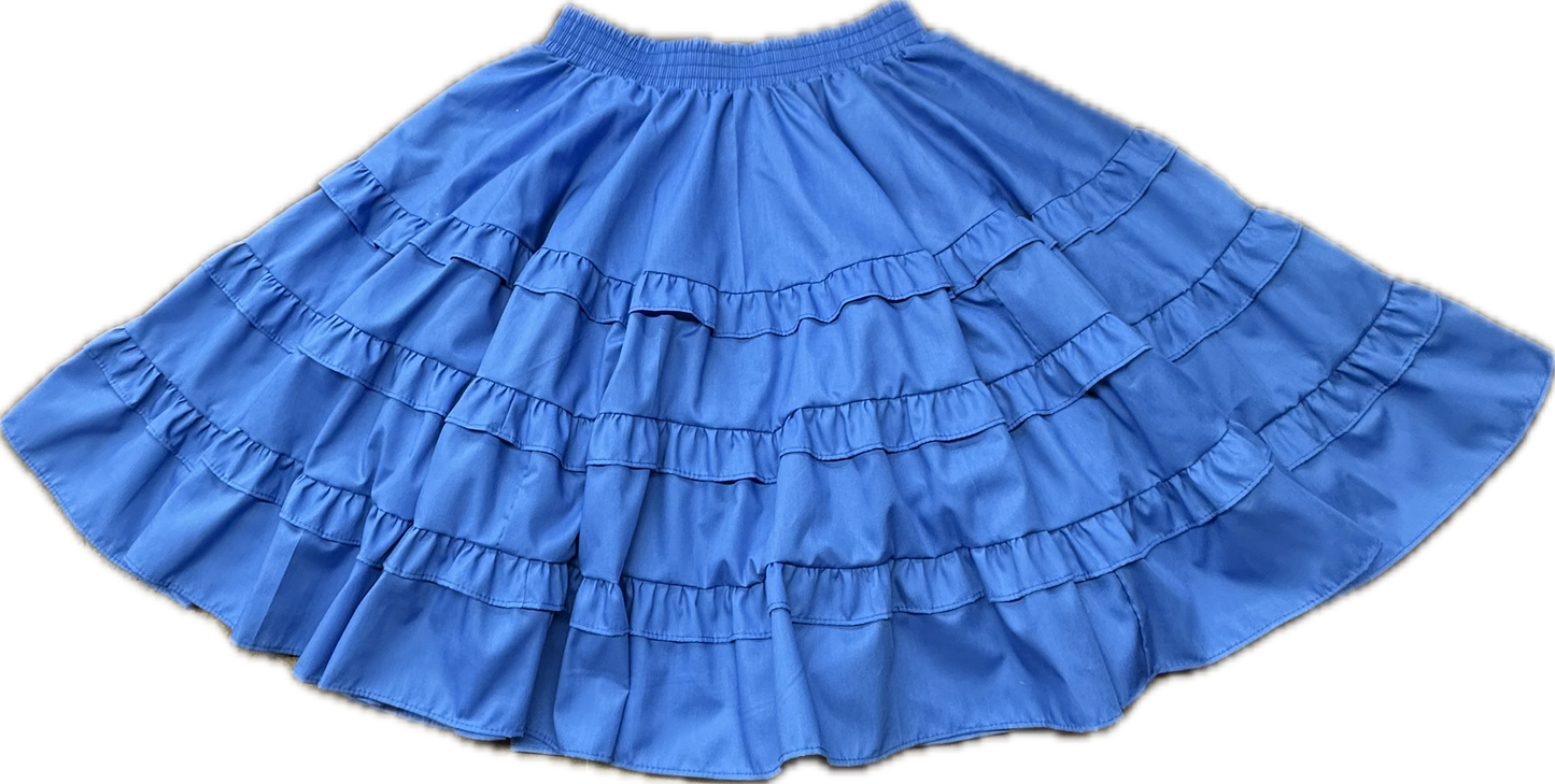 The Double Ruffle Square Dance Skirt by Square Up Fashions is a blue, knee-length skirt with double ruffles and an elastic waistband, shown on a plain background and available in custom sizes.