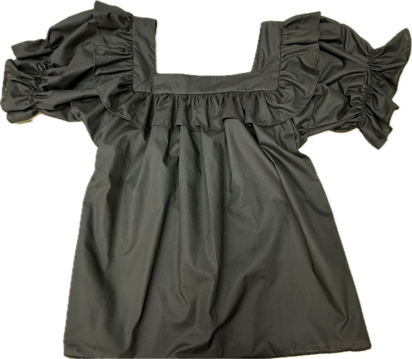 The Square Up Fashions Square Neck Blouse features short puffed sleeves, ruffled trim, and a design that stays tucked in for a polished all-day look.