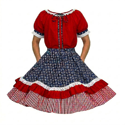 Wearing the Square Up Fashions Patriotic Spirit 250th Anniversary Outfit—red, white, and blue dress with a patterned skirt, lace trim, and striped hem; hands in pockets—perfect for celebrating 250 years of U.S. independence.