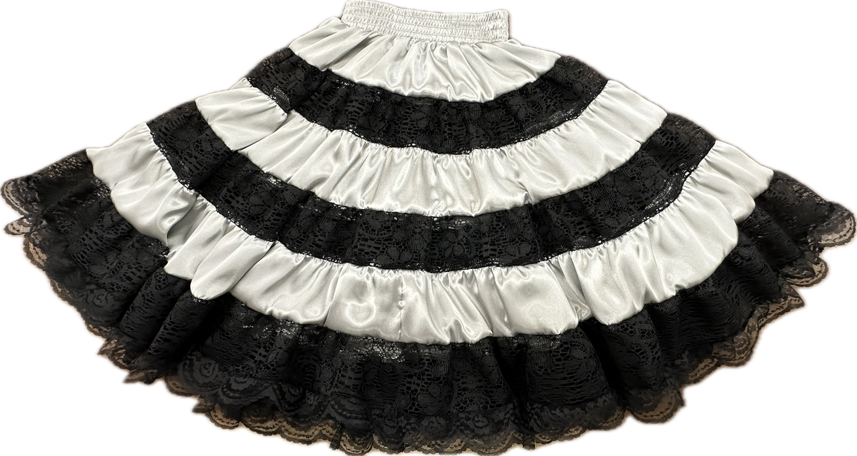 A black and white Charmeuse Square Dance Skirt made with shiny fabric by Square Up Fashions.