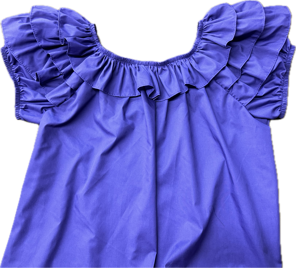 A Triple Ruffle Blouse by Square Up Fashions with ruffles on the shoulders. Easy returns.