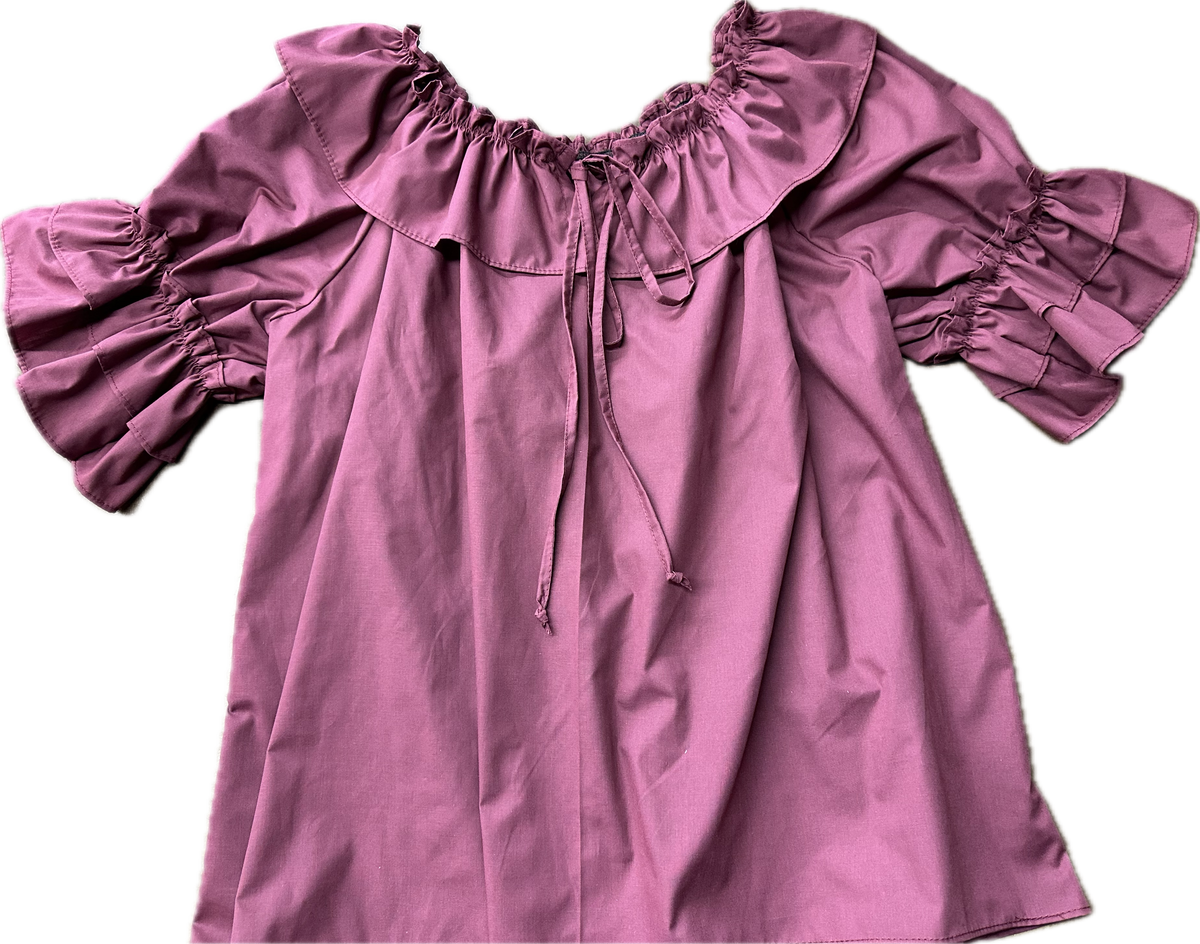 A Faux Drawstring Blouse by Square Up Fashions with double ruffle sleeves.