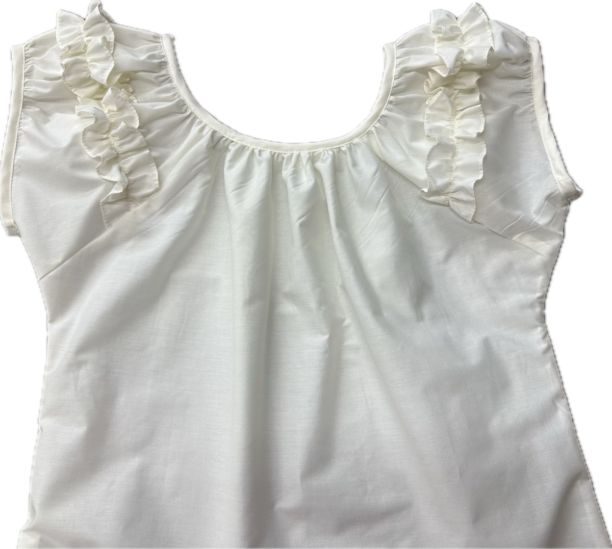 A Basic Ruffle Blouse from Square Up Fashions with ruffled sleeves.
