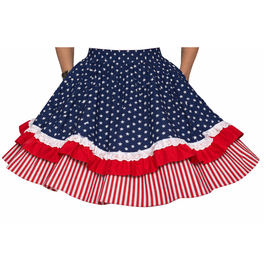 The Square Up Fashions Patriotic Spirit 250th Anniversary Skirt features a navy and white star pattern, white lace trim, red ruffle, and striped hem—perfect for patriotic square dance events.