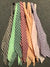 A group of CLEARANCE Gingham Scarf Ties 1/4" in different colors laid out on a carpet, readily available in stock.
