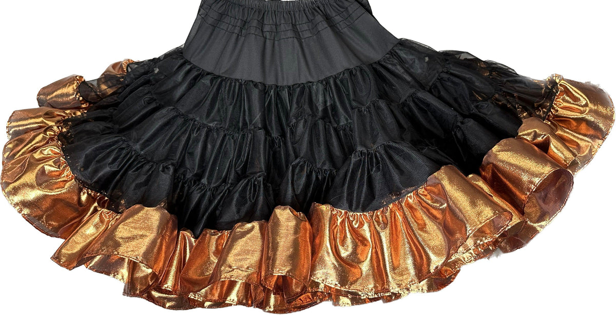 A black and gold Combo Metallic Petticoat skirt with ruffles, made of fabric from Square Up Fashions.